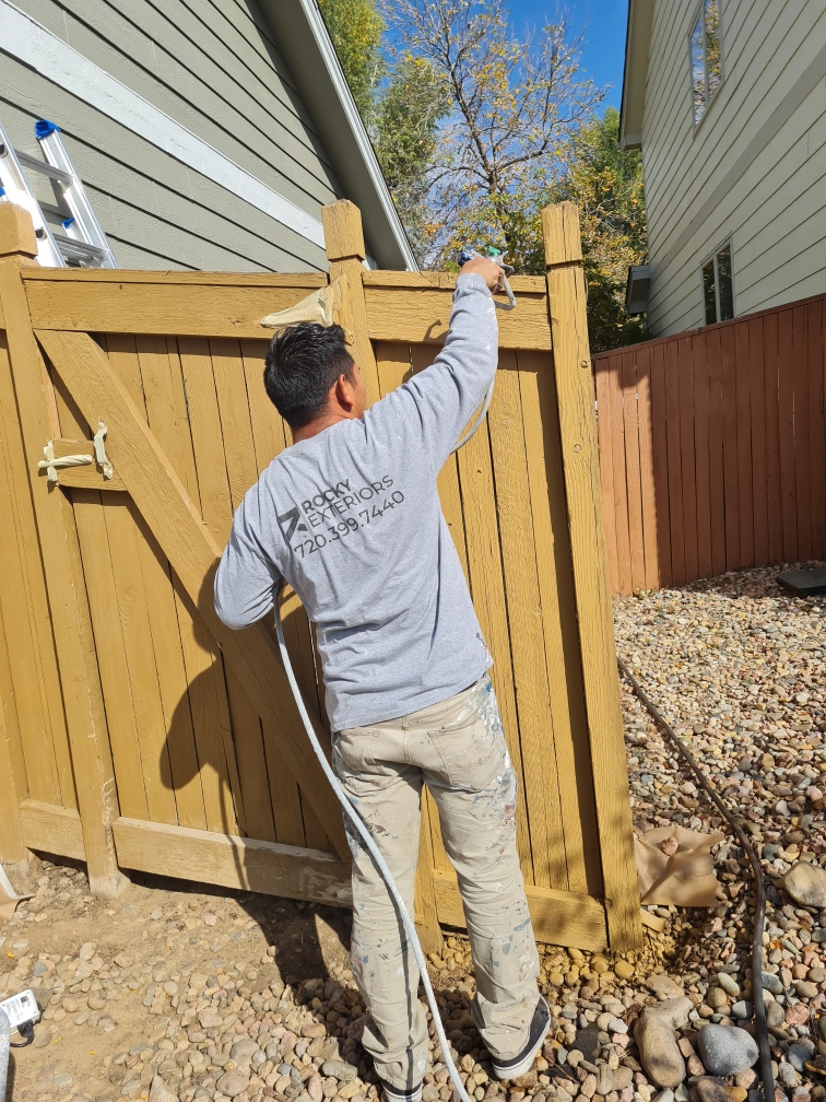 Fence staining